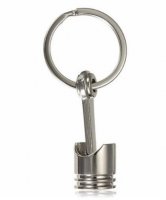 Cheițar cu piston pentru brelocuri